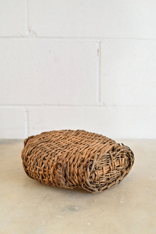 vintage french wicker wrapped demijohn