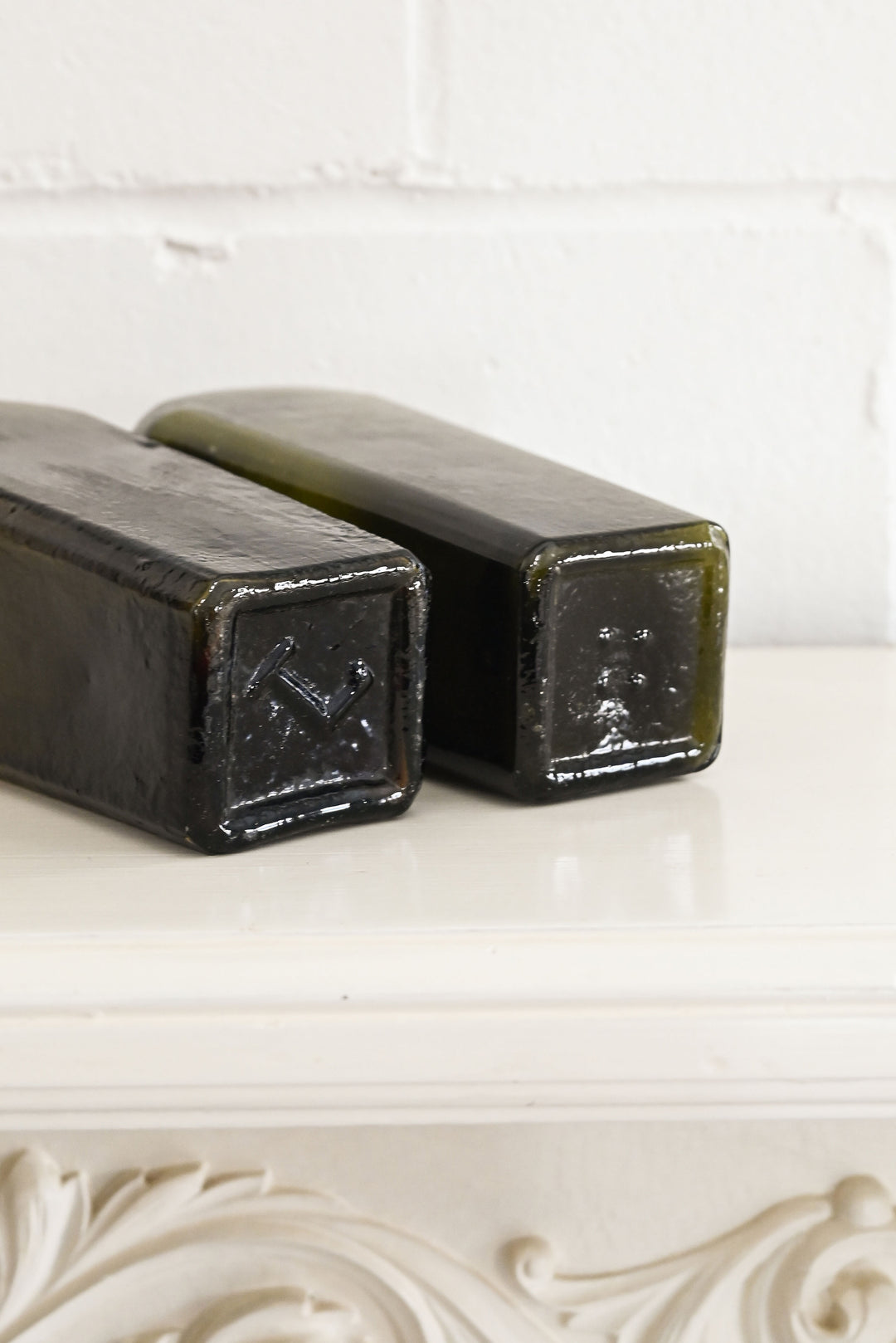 vintage green glass gin bottles