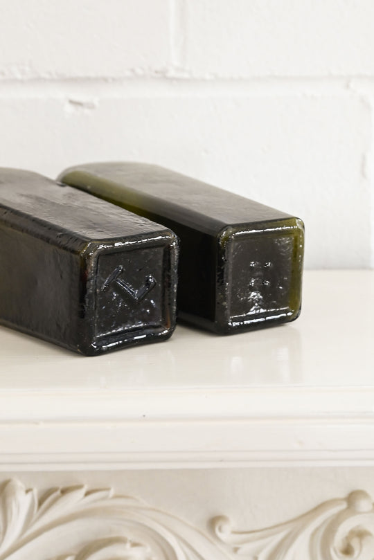 vintage green glass gin bottles