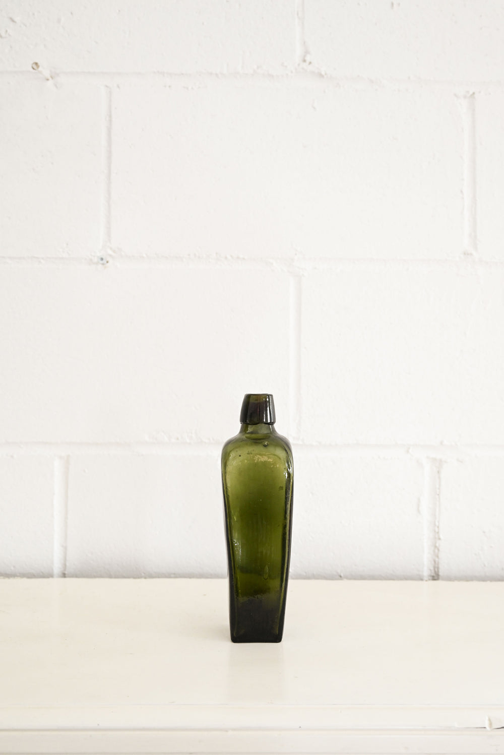 vintage green glass gin bottles
