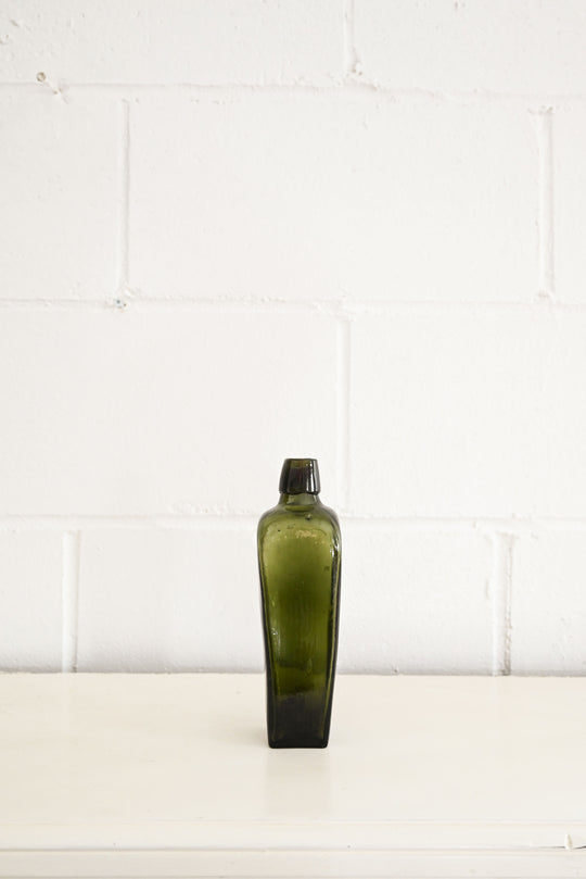 vintage green glass gin bottles