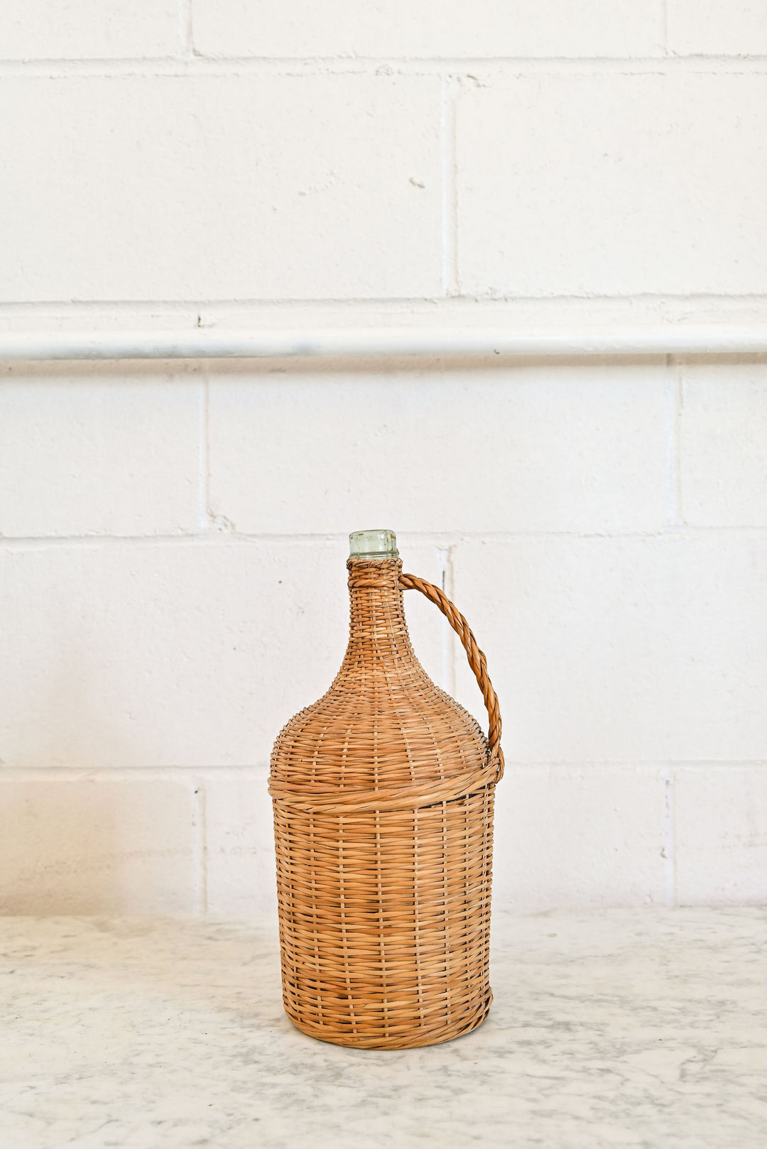 vintage french wicker wrapped demijohn