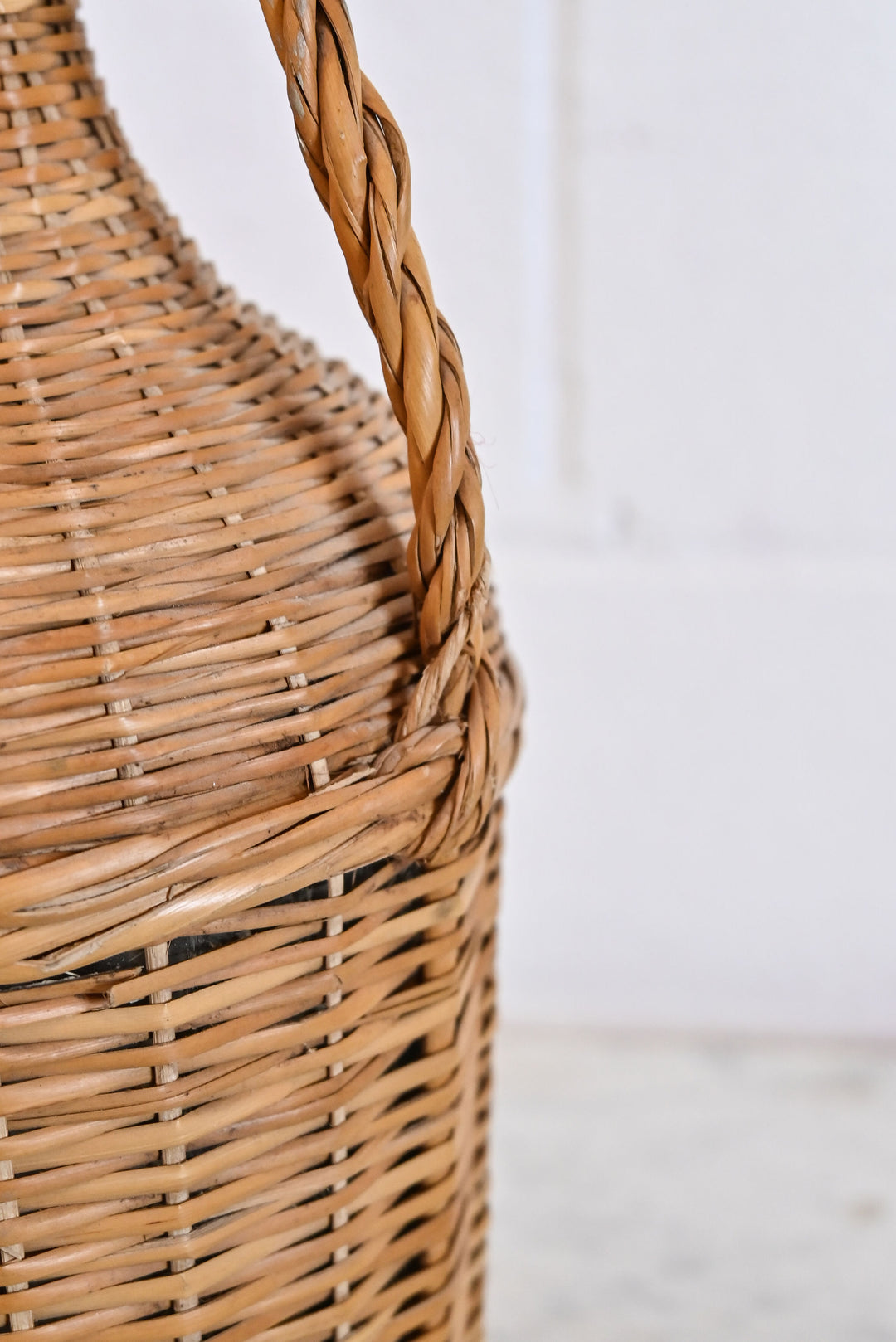 vintage french wicker wrapped demijohn