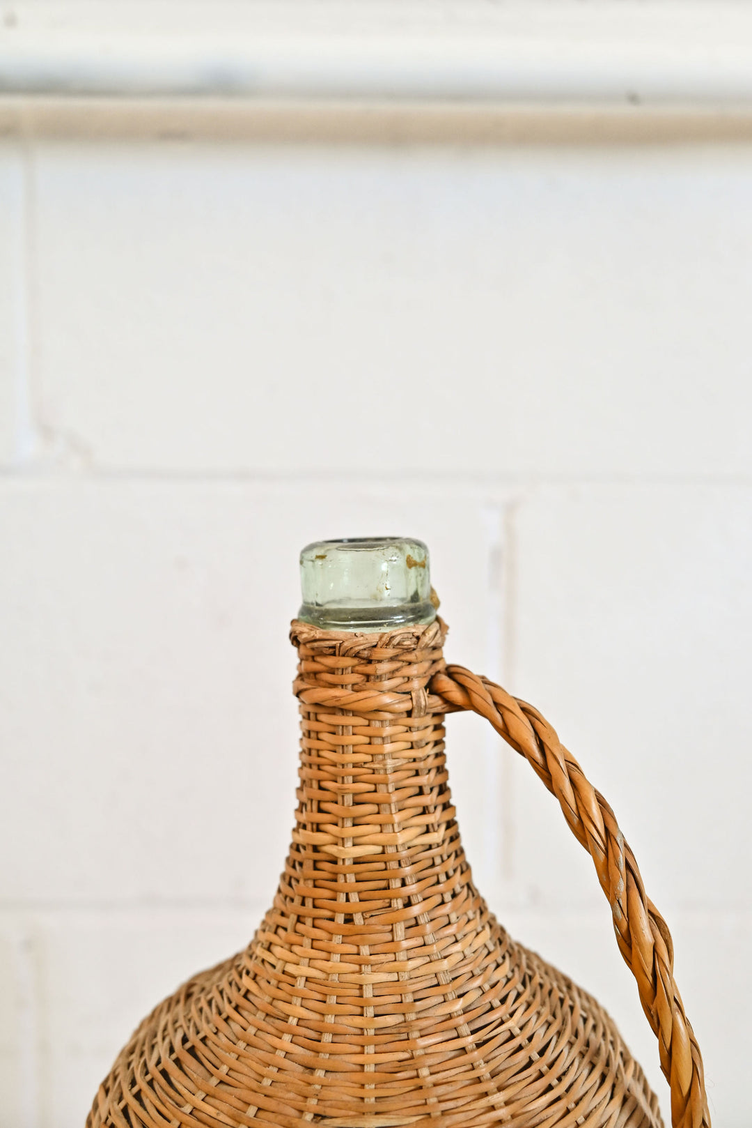 vintage french wicker wrapped demijohn