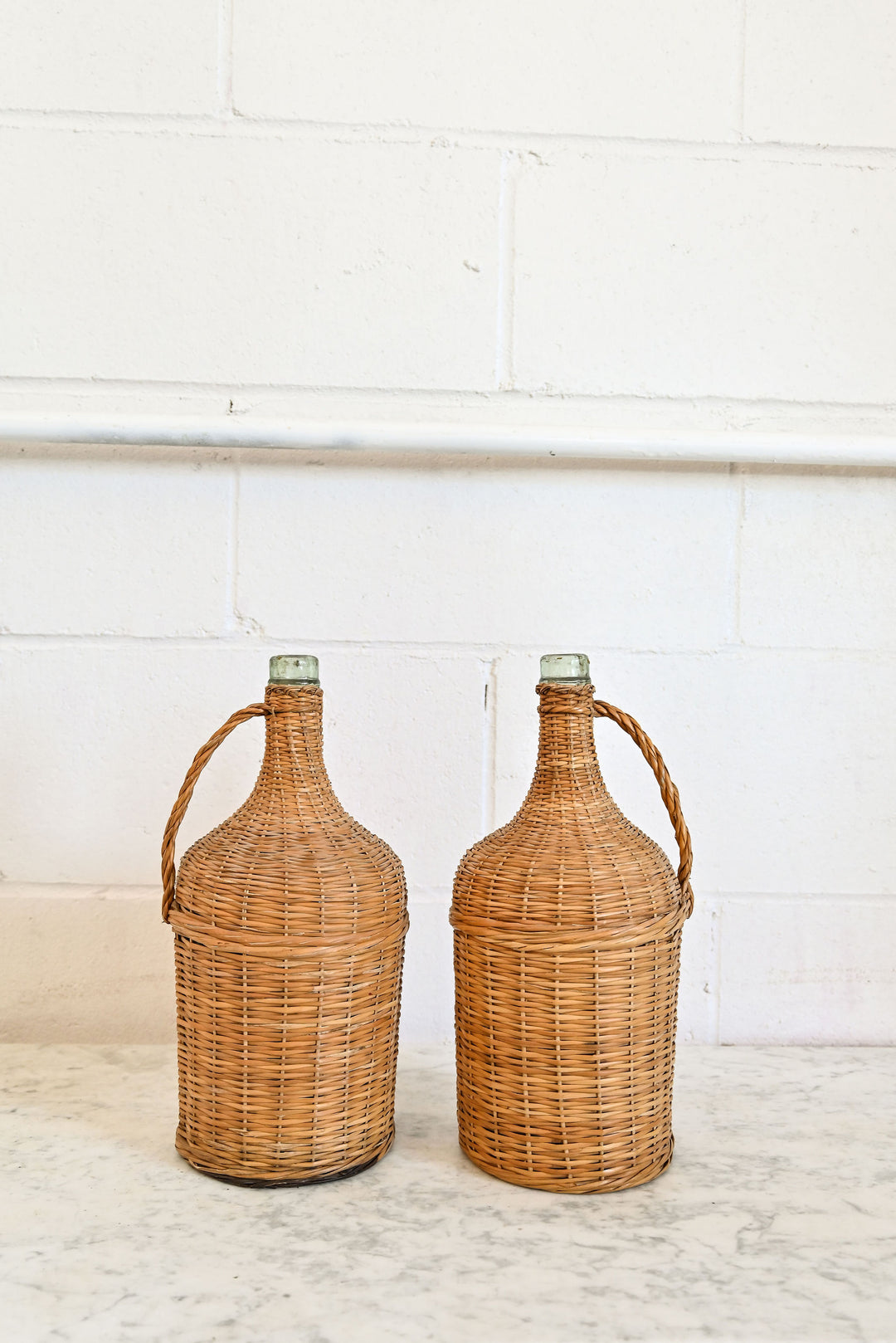 vintage french wicker wrapped demijohn