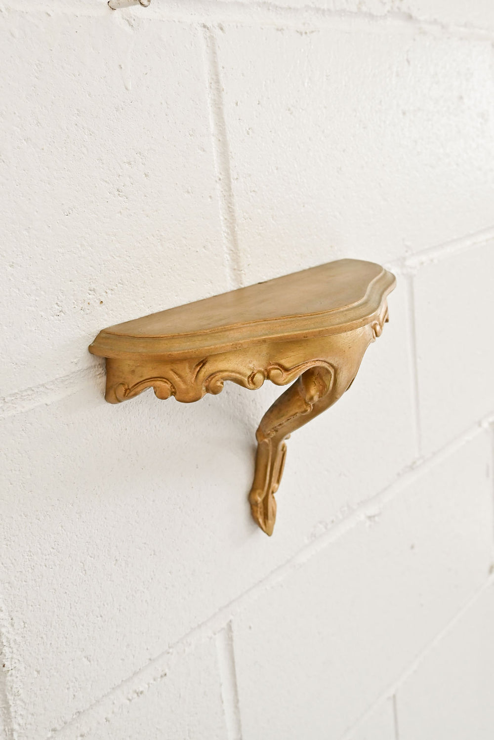 vintage petite florentine gilt floating shelf