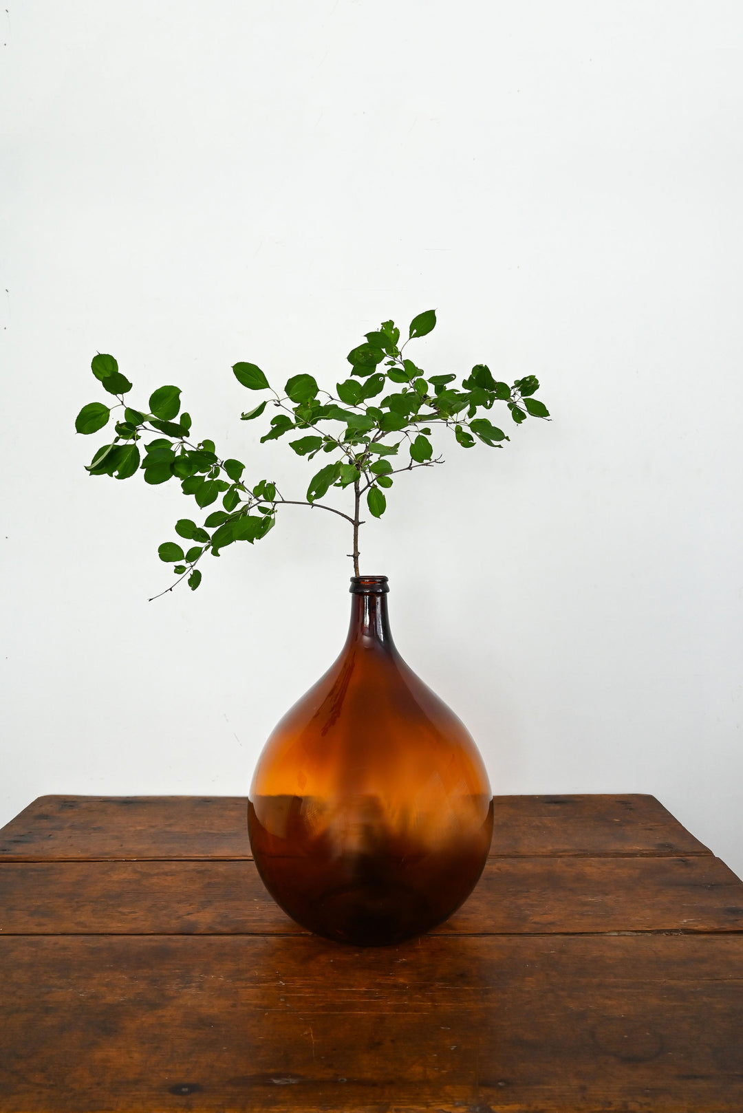 vintage amber demijohn bottle