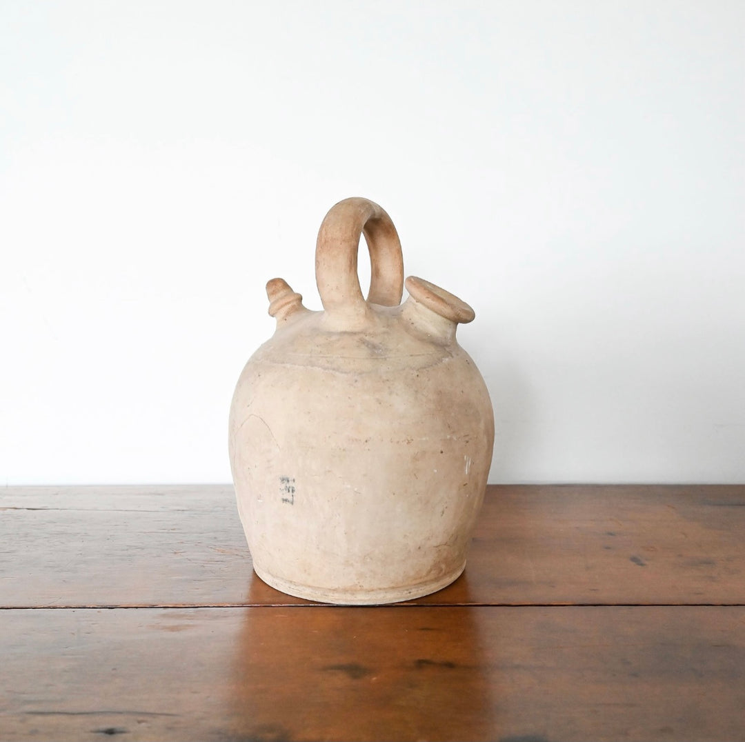 antique European stoneware oil vessel