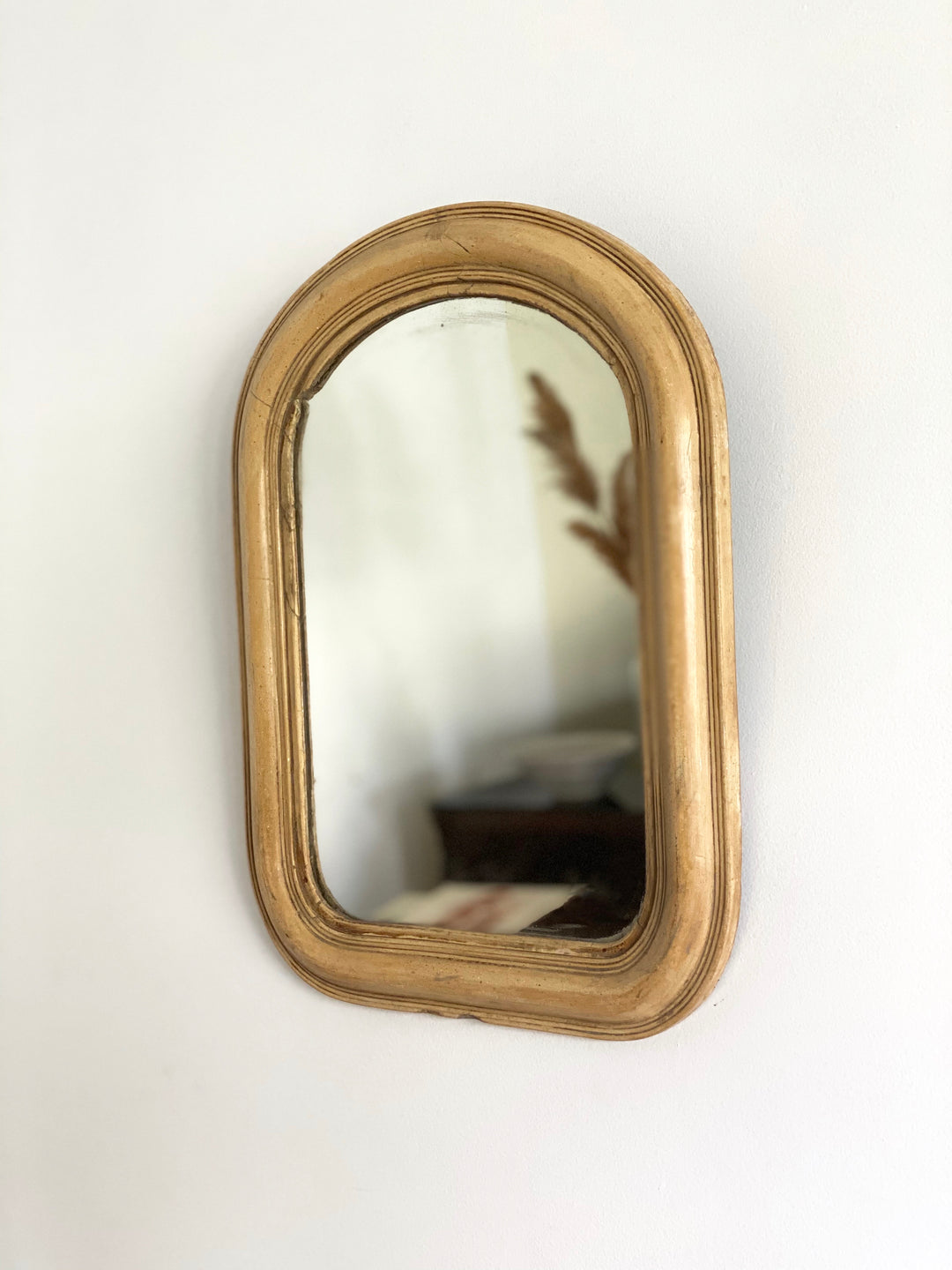 antique arched mirror