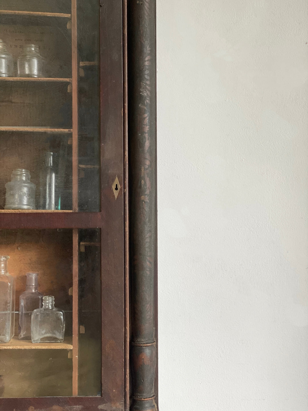 antique wall mounted apothecary cabinet