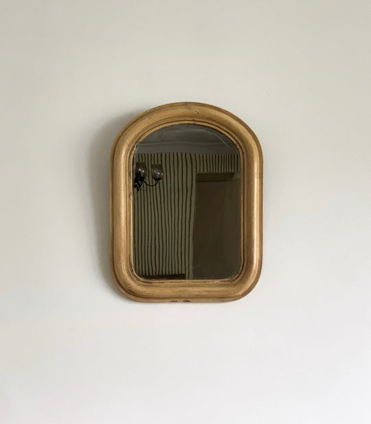 antique arched mirror