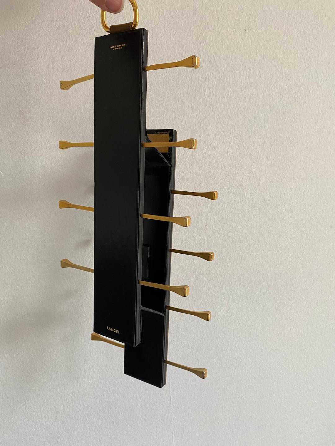 midcentury french brass and leather Longchamp tie rack by Jacques Adnet