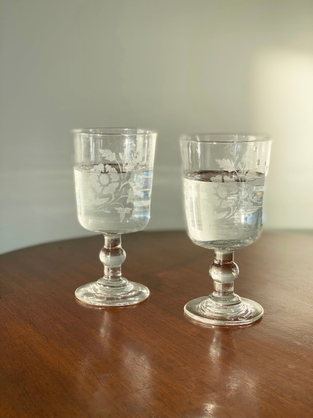 pair of antique French hand blown etched wine goblets