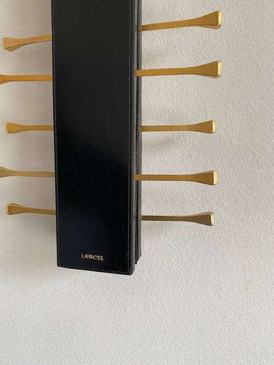 midcentury french brass and leather Longchamp tie rack by Jacques Adnet