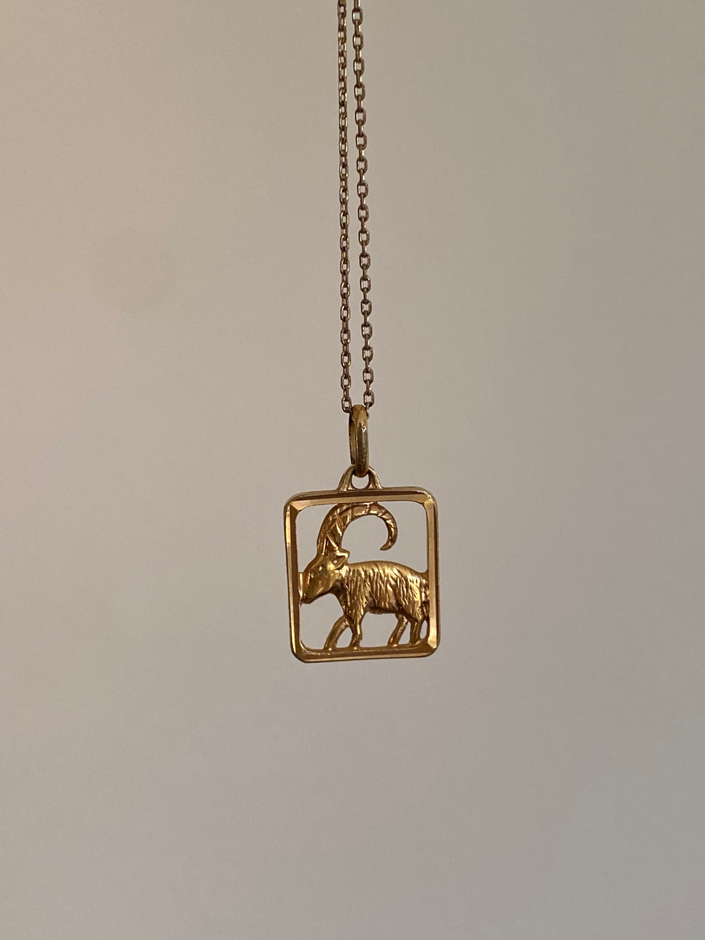 vintage French gold tone Capricorn astrological pendant