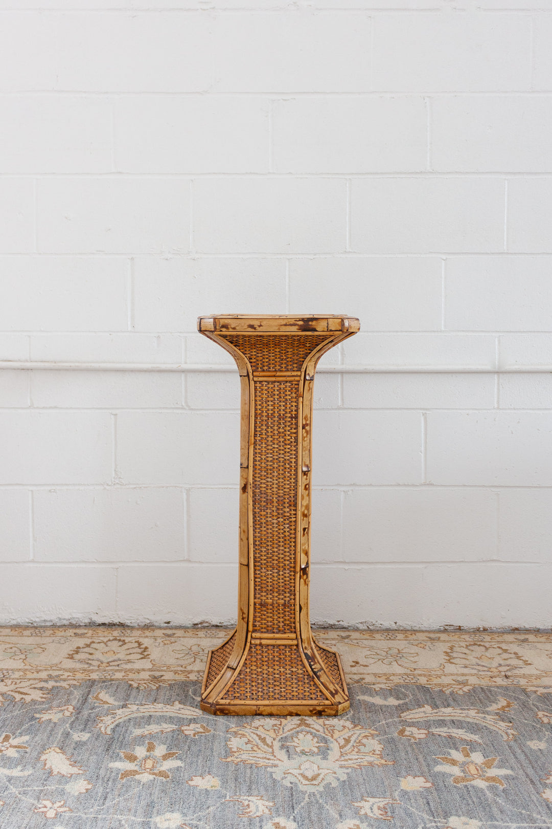 rattan and burnt bamboo plinths