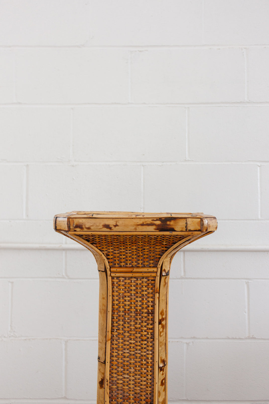 rattan and burnt bamboo plinths
