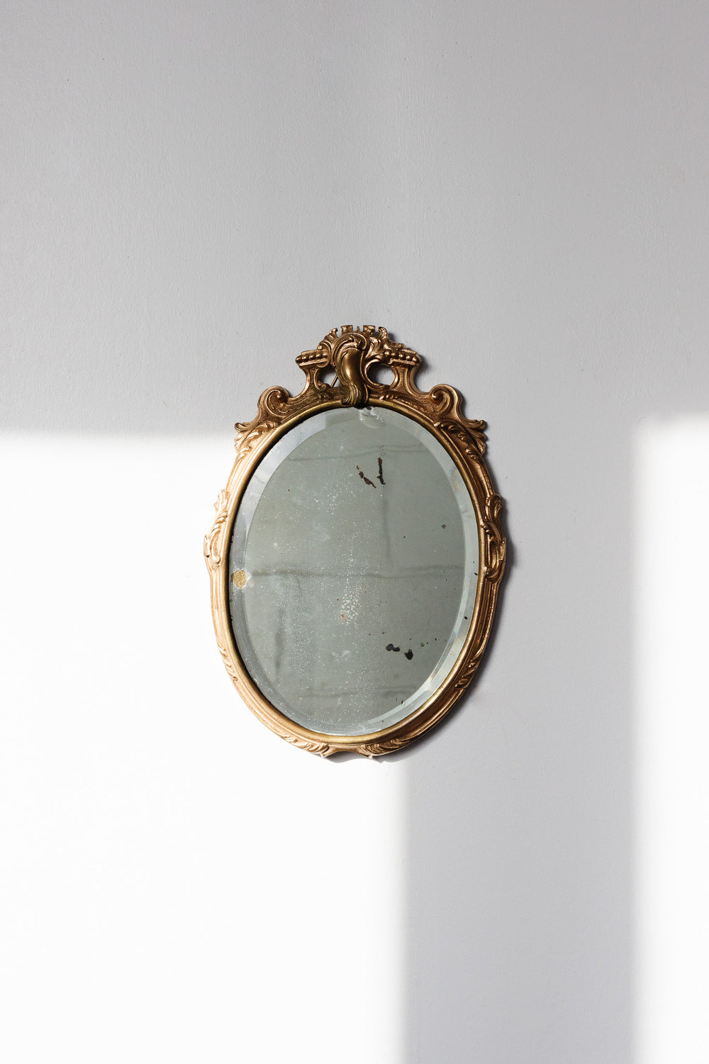 antique french petite beveled mirror