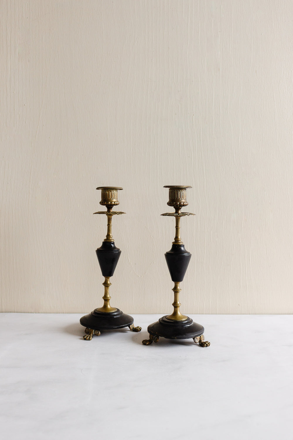 pair of 19th century French Napolean III brass and black marble candlesticks