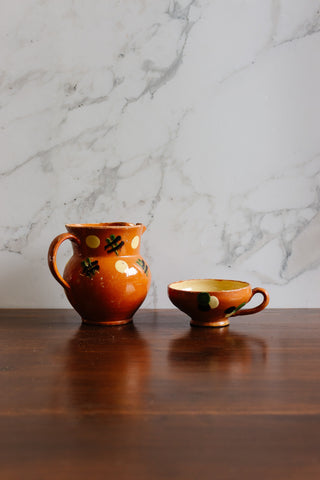 antique french redware spotted pitcher and cup