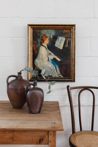 "woman at the piano" by Renoir