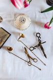 vintage English brass candle snuffers and antique wick trimmers