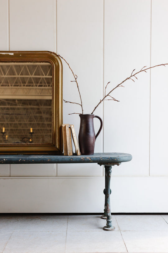 antique wood and cast iron farmhouse bench