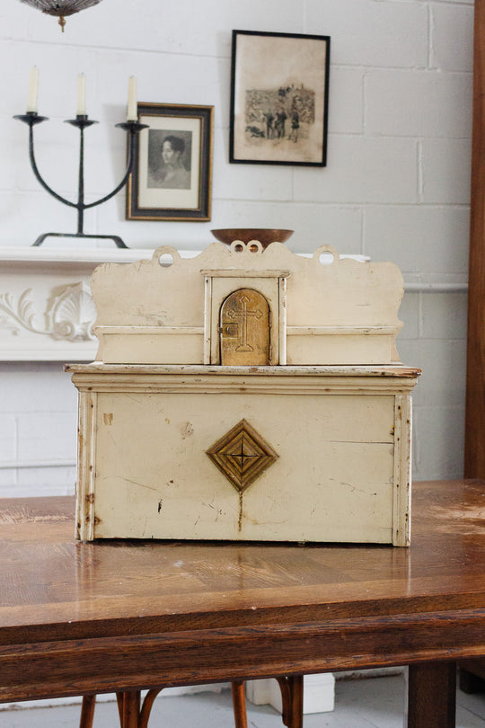 vintage religious wooden relic with brass accents