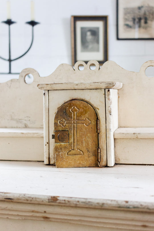 vintage religious wooden relic with brass accents