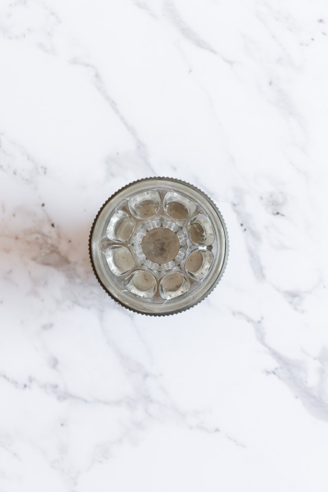 small vintage French floral frog with pewter pedestal base