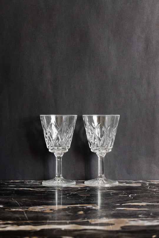 pair of vintage french cut glass wine glasses