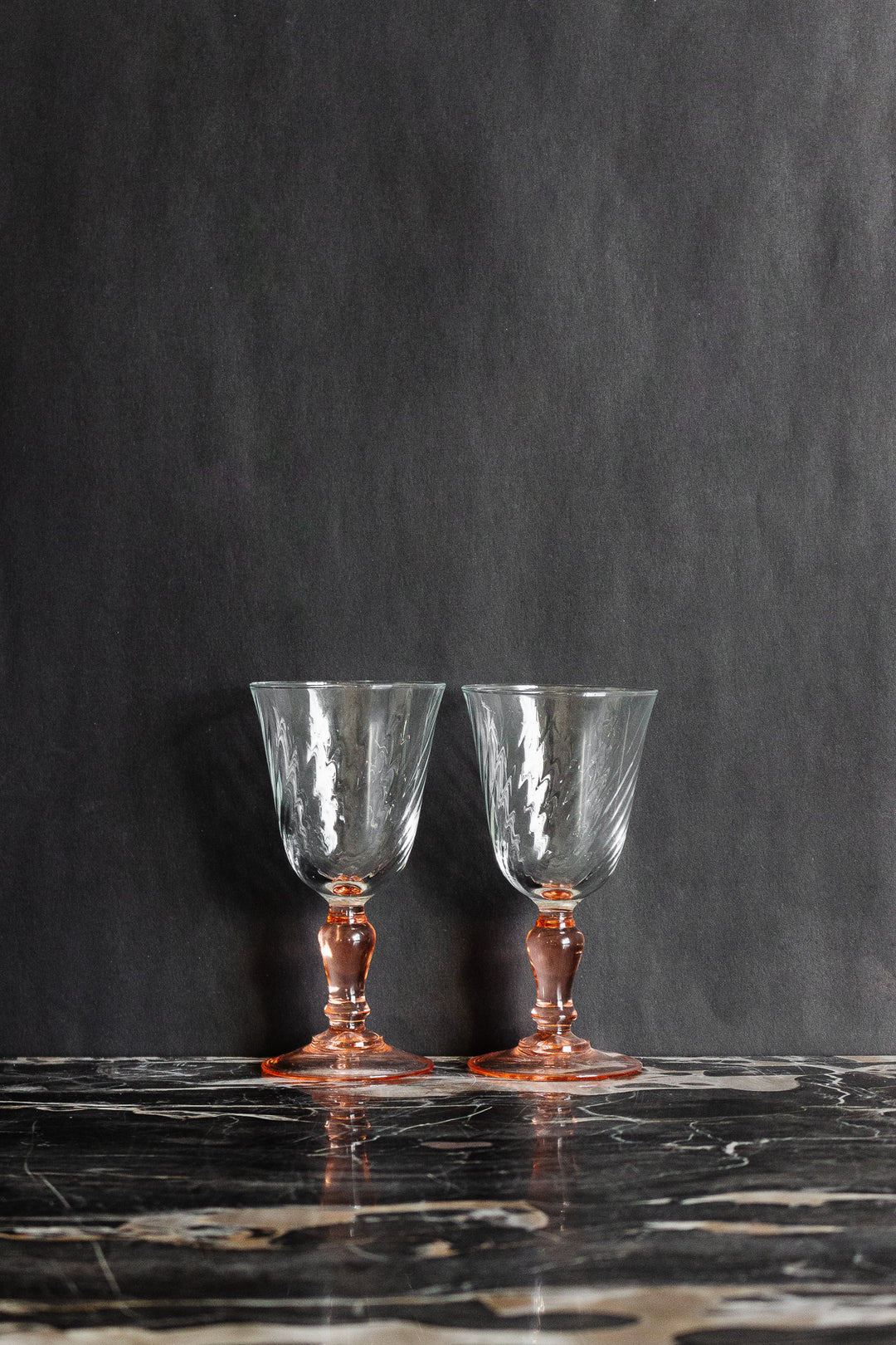 pair of vintage French rosaline stem wine glasses