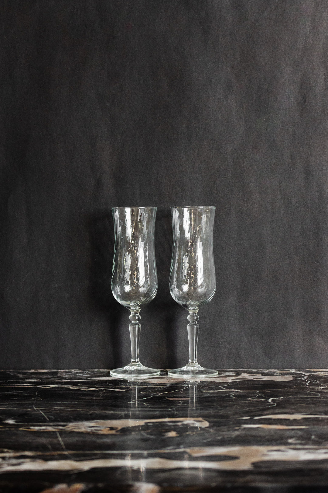 pair of vintage French spiral glass champagne flutes