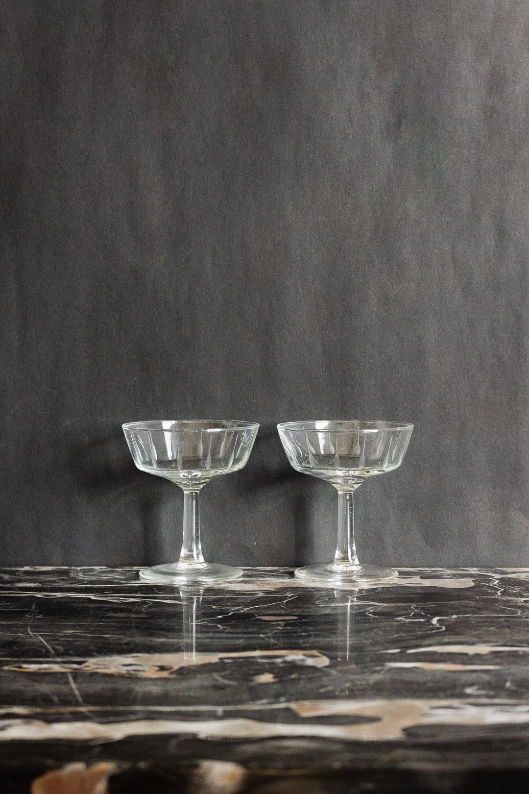 pair of vintage French etched glass champagne coupes