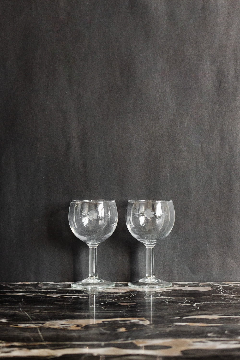 pair of vintage french etched wine glasses