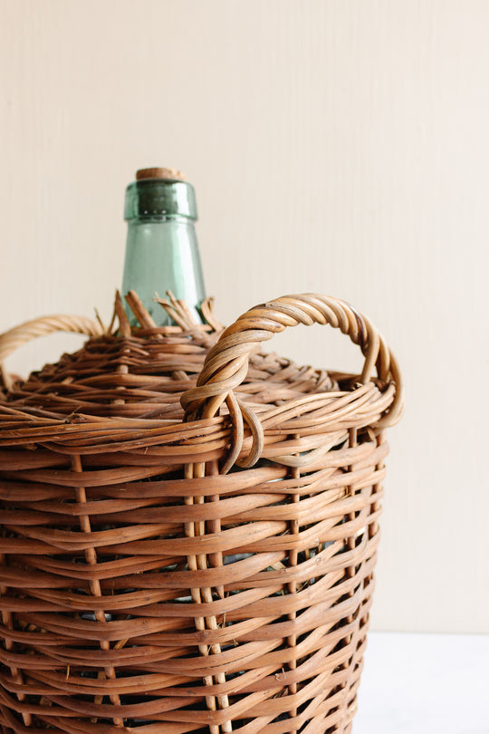 antique french large wicker wrapped demijohn