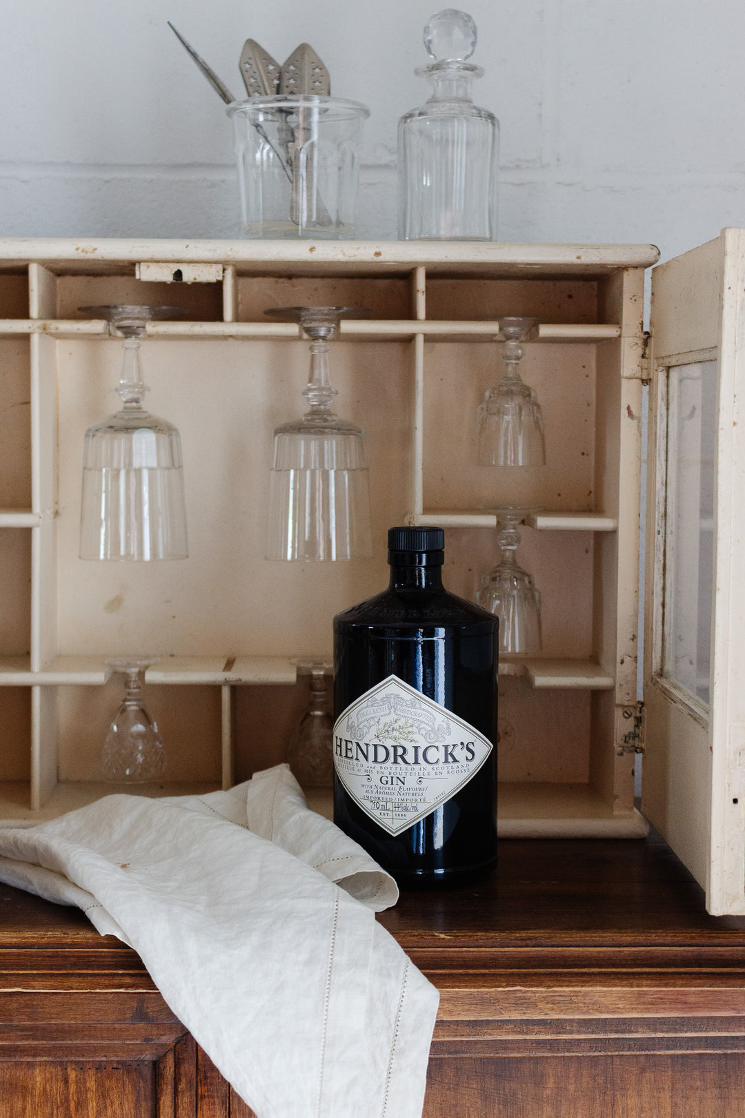 vintage french rustic stemware cabinet