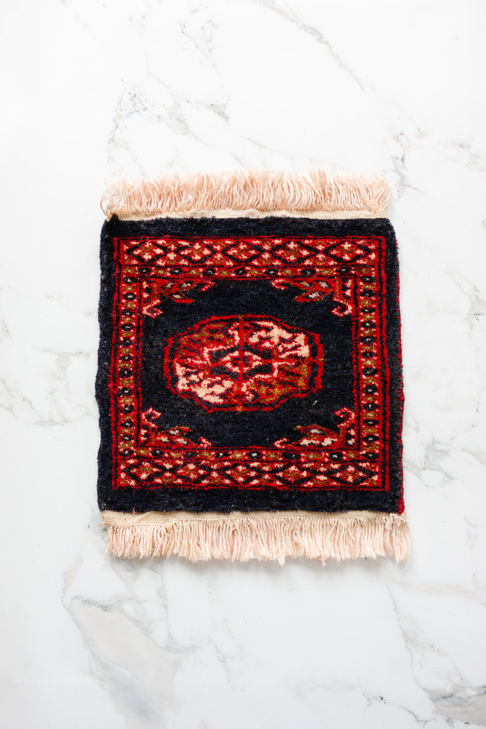 vintage Persian placemat sized rug, navy and red