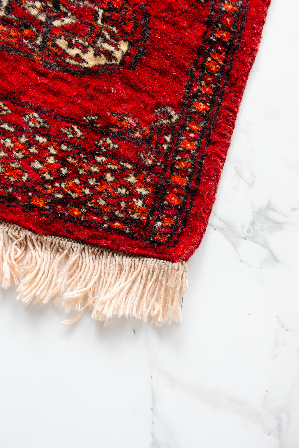 vintage Persian placemat sized rug, red