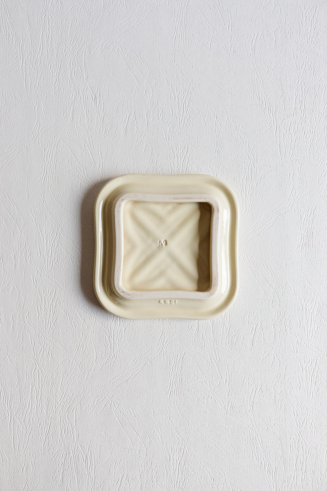 pair of art deco bottle coasters