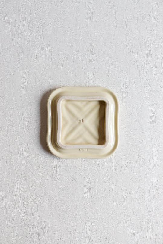 pair of art deco bottle coasters