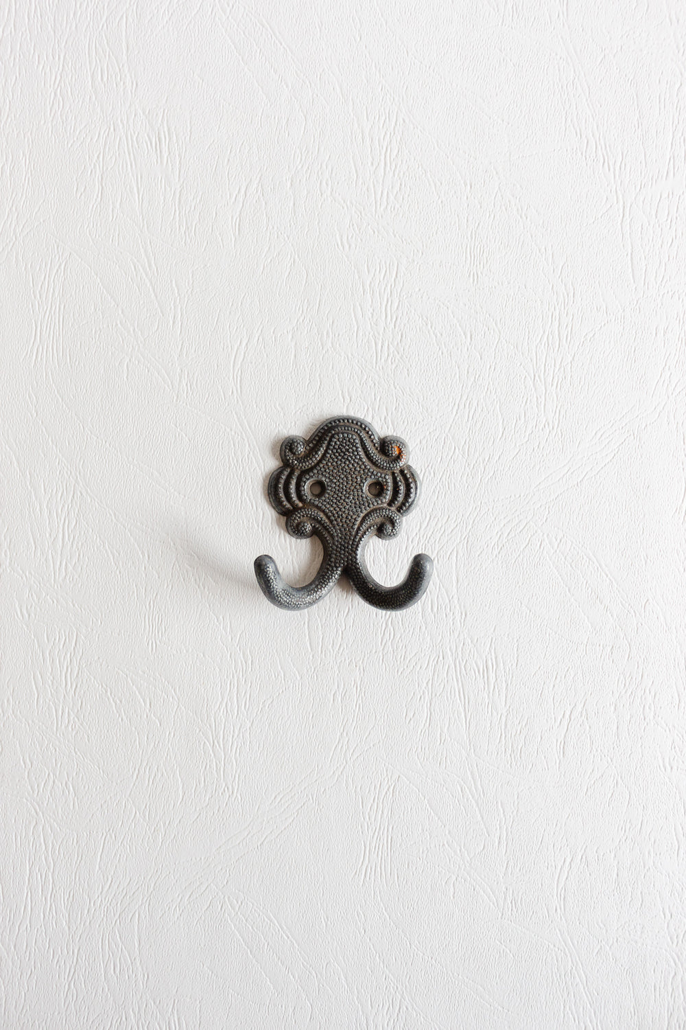 vintage french cast metal hook