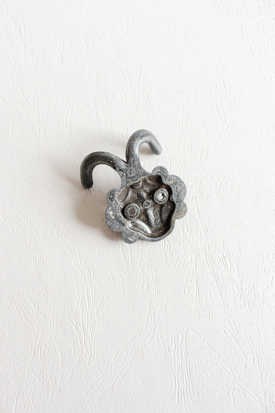 vintage french cast metal hook