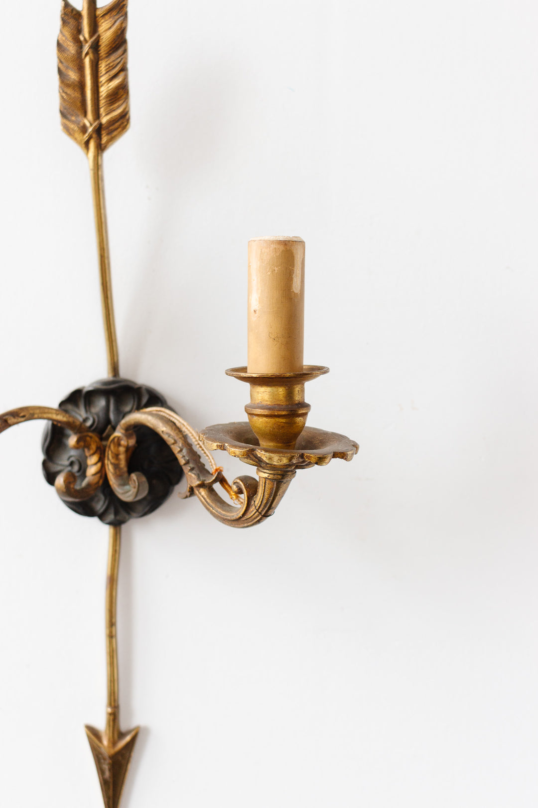 pair of 19th century French empire style brass arrow sconces