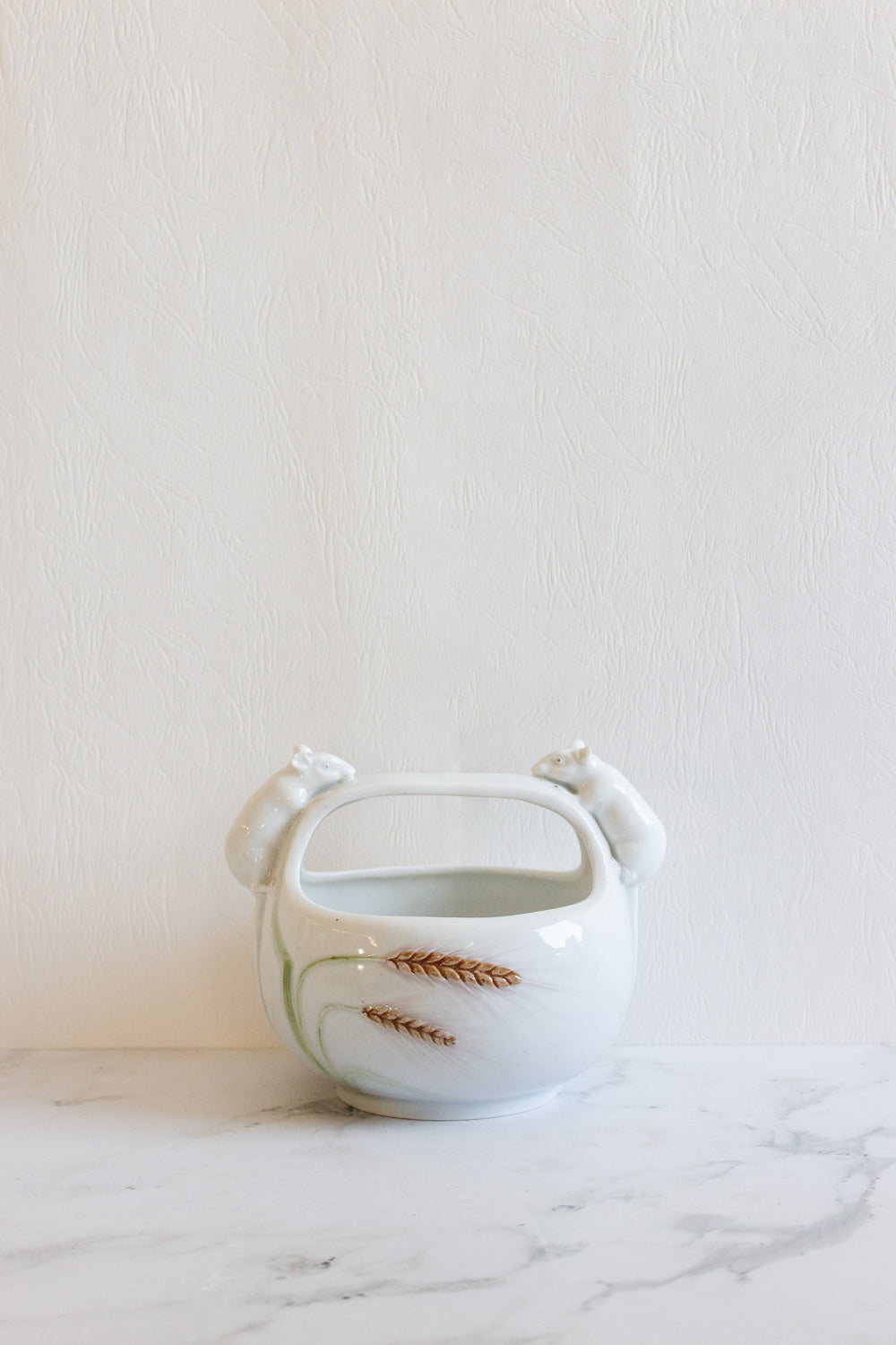 vintage Austrian porcelain basket with "petit souris"
