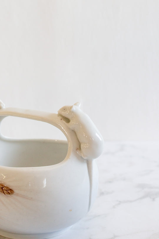 vintage Austrian porcelain basket with "petit souris"