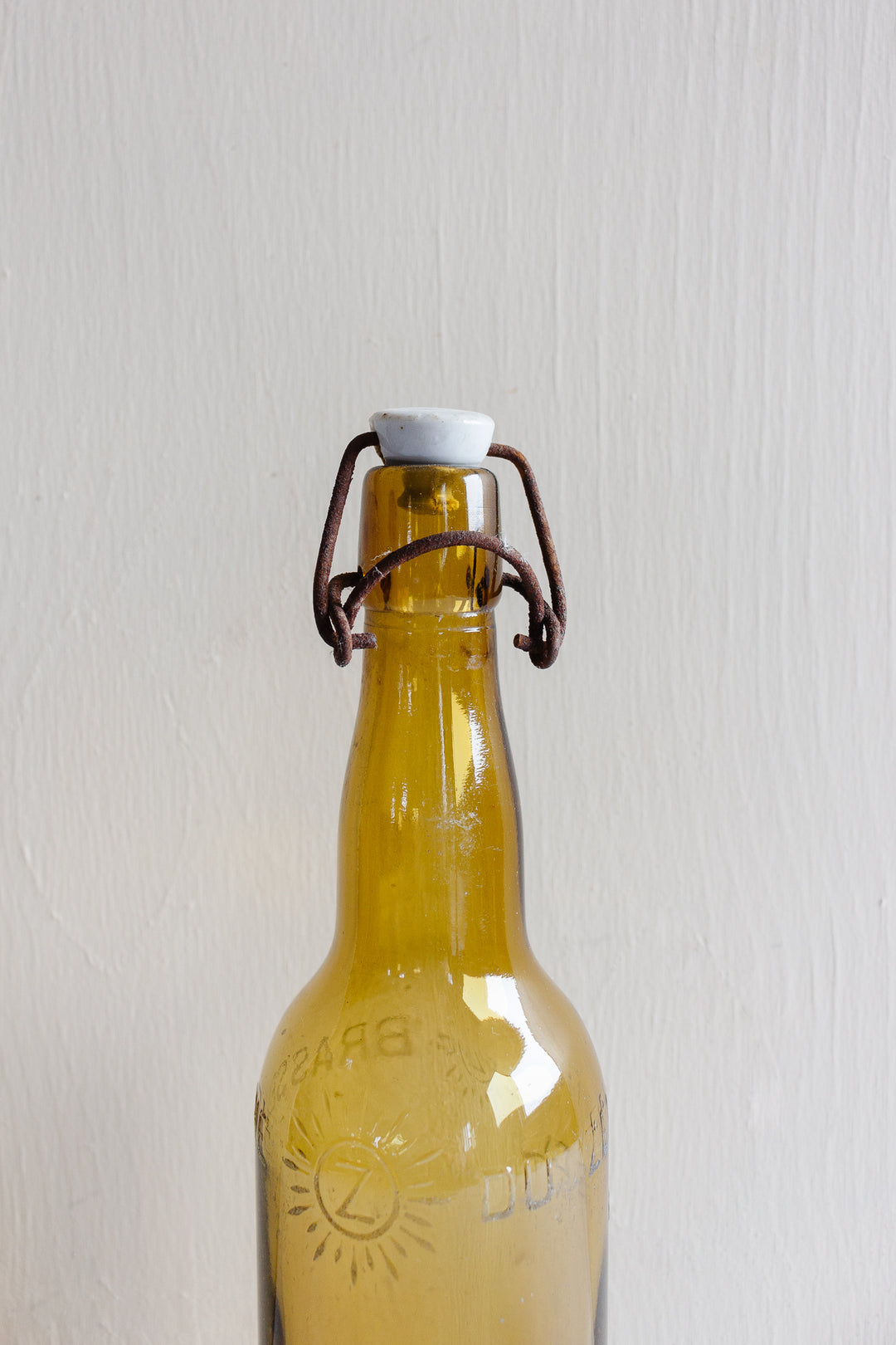pair of vintage french amber brasserie bottles