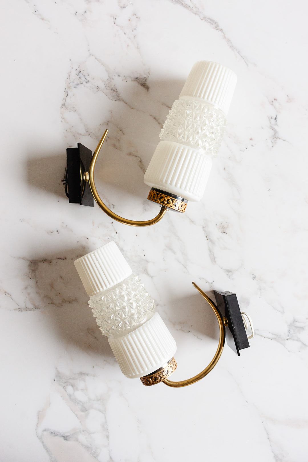 pair of 1960s french molded glass wall mounted sconces