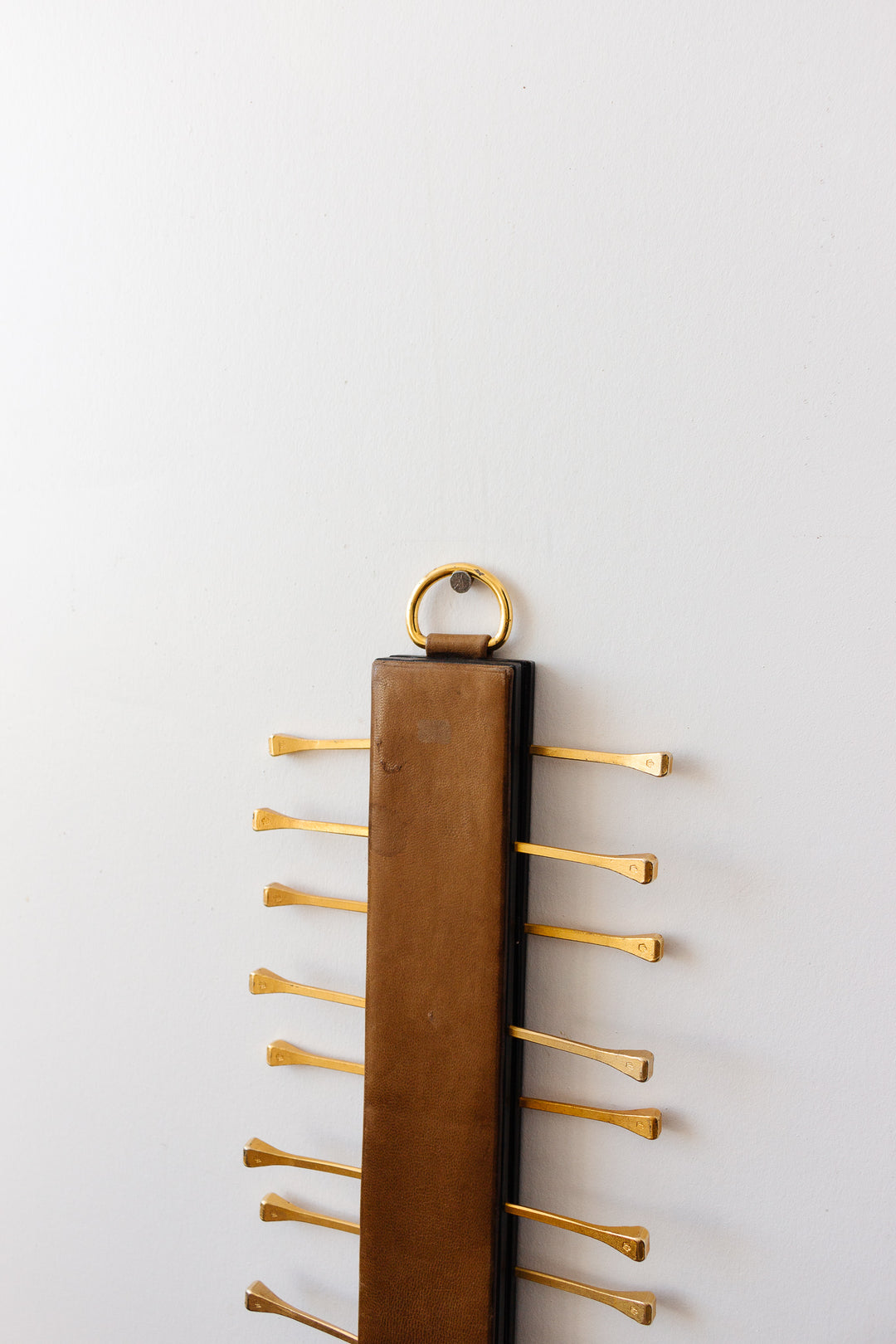 midcentury french brass and leather Longchamp tie rack by Jacques Adnet