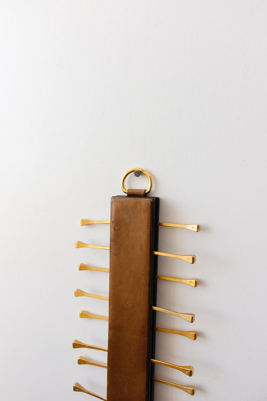 midcentury french brass and leather Longchamp tie rack by Jacques Adnet